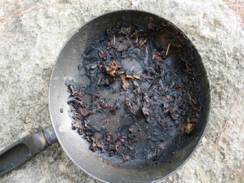 cleaning burnt pan