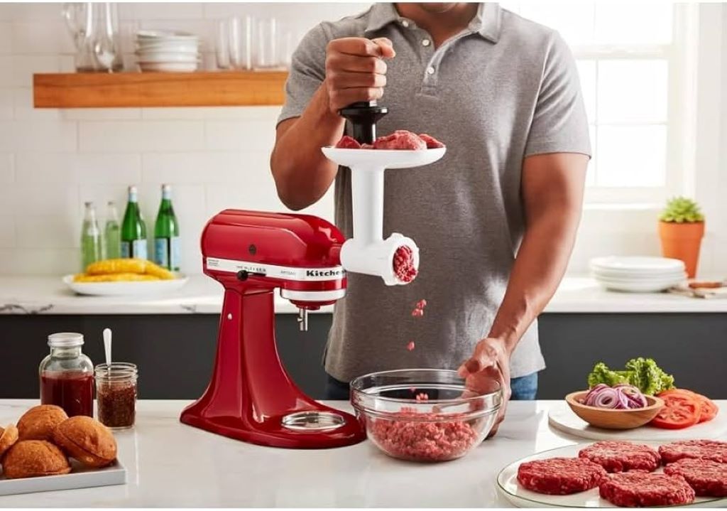 KitchenAid stand mixer with meat grinder attachment in use for fresher meat.