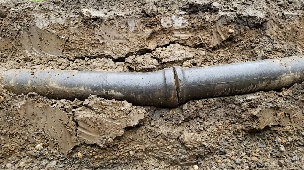 Main sewer line repair in Phoenix residential neighborhood